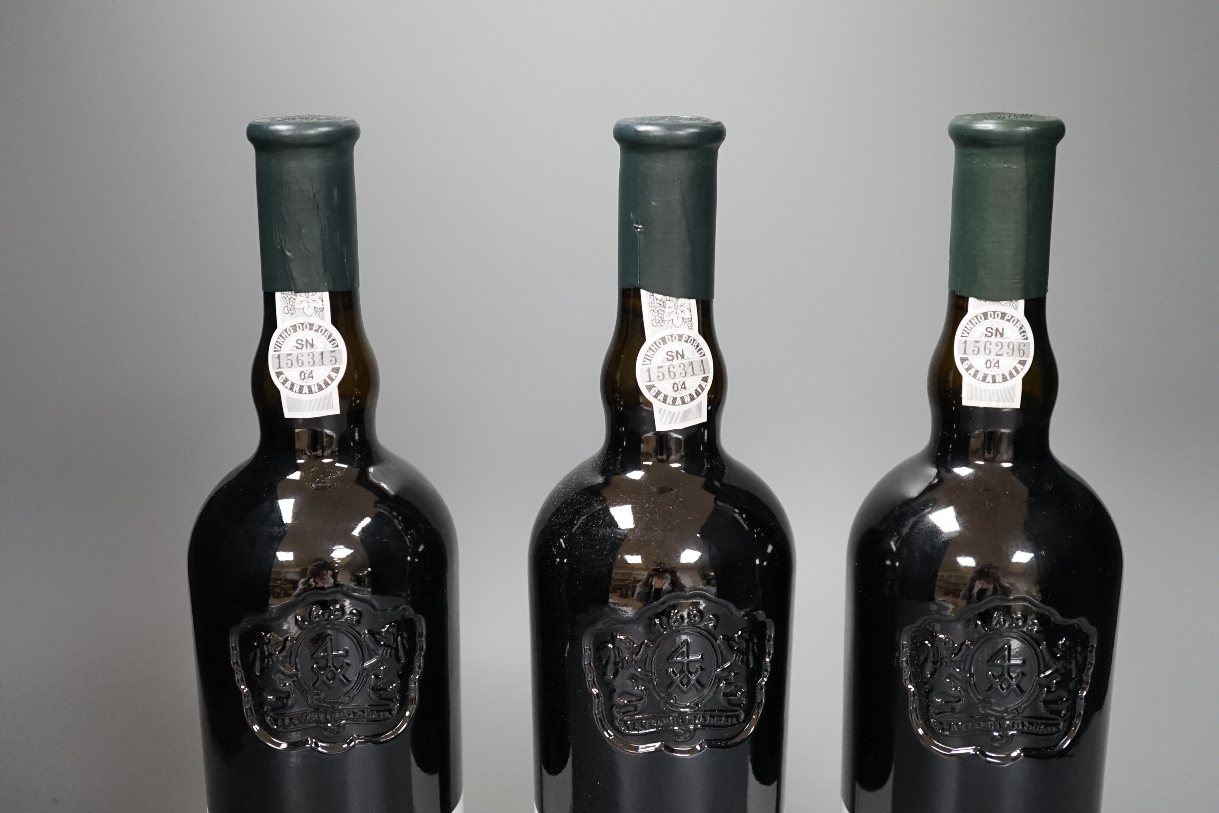 Three bottles of Taylors 2009 vintage port.